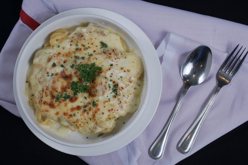 Creamy chicken pasta bake at pizza factory